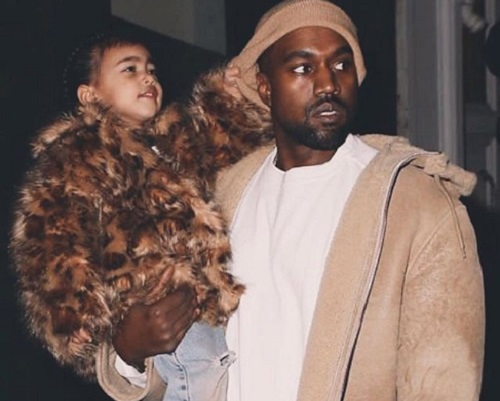 Kanye West a Kim Kardashiannel közös kislányával, North-szal